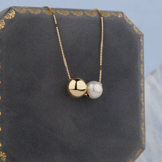 Złoty naszyjnik celebrytka 585 z perłą naturalną i złotą kulką 14K