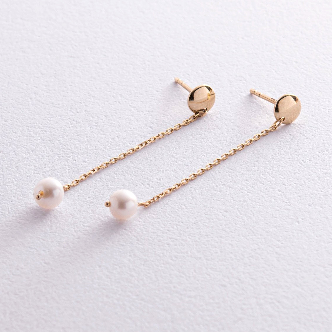 Delikatne złote kolczyki z perłą biżuteria damska