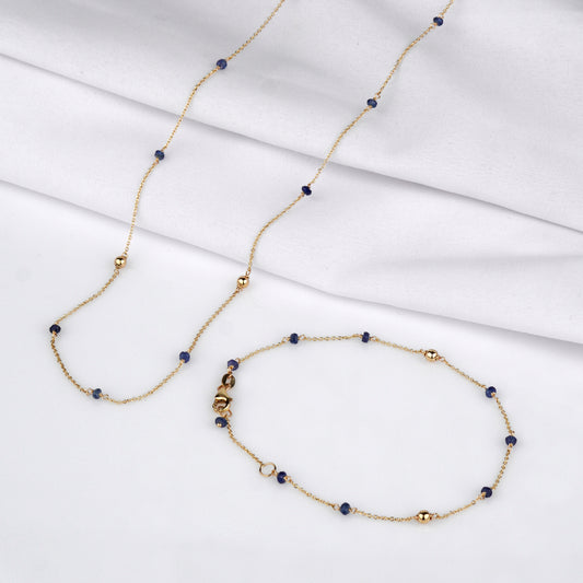 Złoty komplet 585 z szafirami – naszyjnik i bransoletka w subtelnym stylu