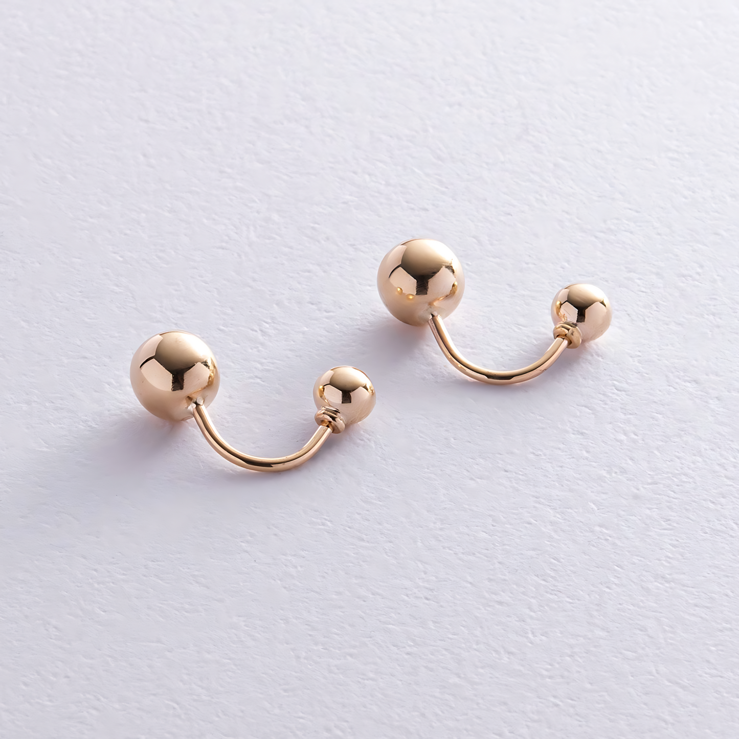 Asymetryczne kolczyki złote kule biżuteria damska