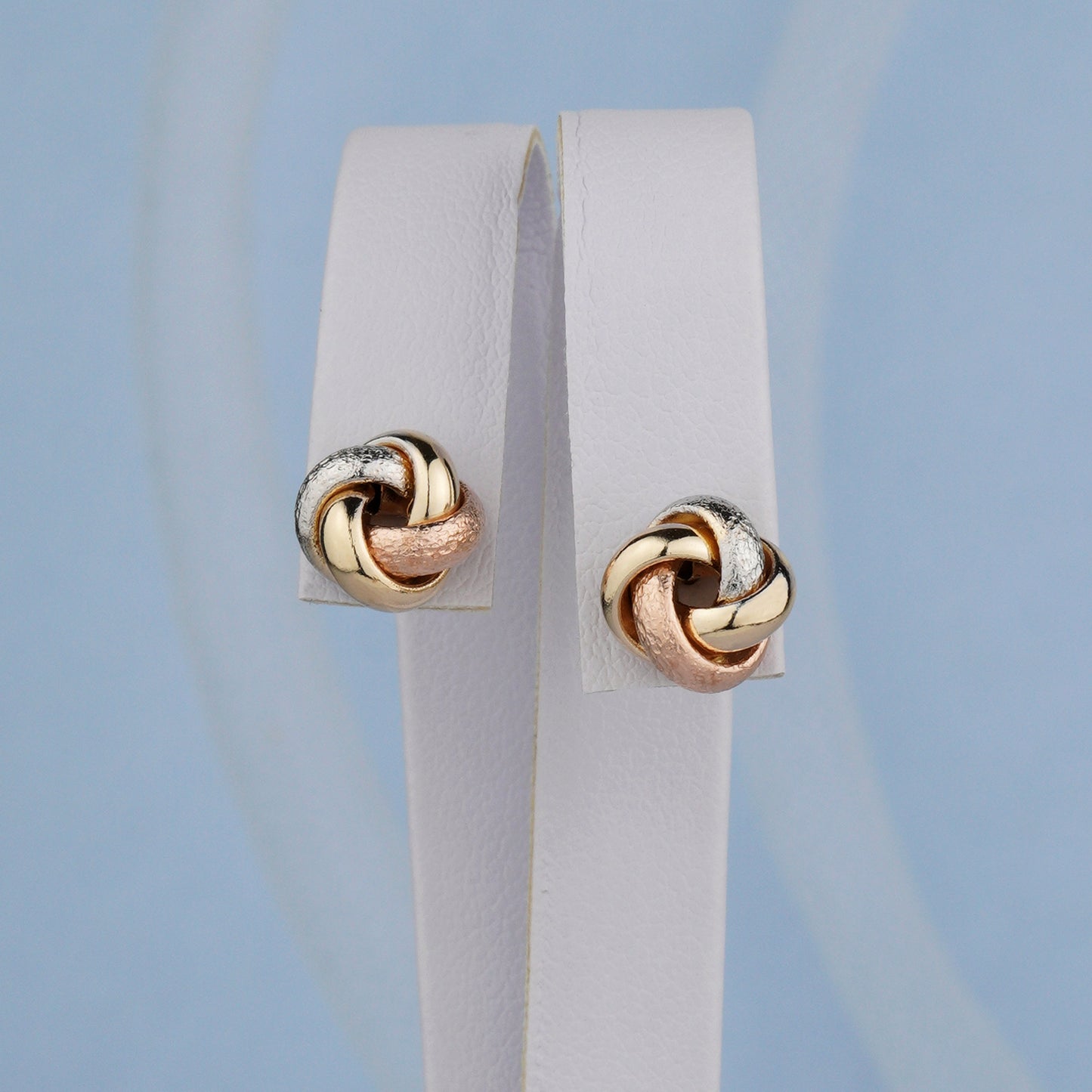 Złote kolczyki supełki z trzech kolorów złota