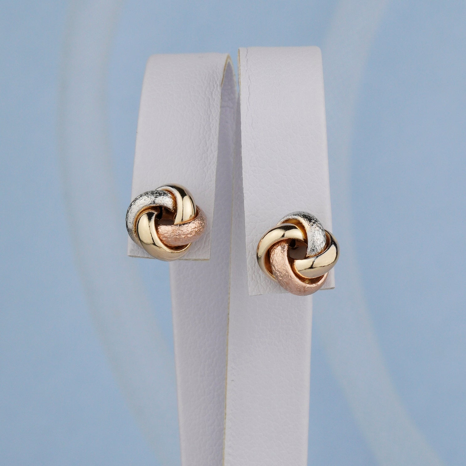 Złote kolczyki supełki z trzech kolorów złota