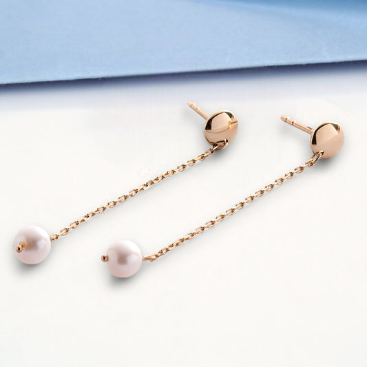 Złote kolczyki z perłami na łańcuszku 585