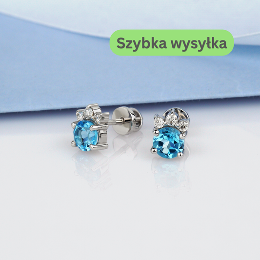 Złote kolczyki z topazem i lśniącymi moissanitami. Eleganckie złote kolczyki dla kobiet, idealne na prezent. Kolczyki złote sztyfty z błyszczącymi kamieniami.