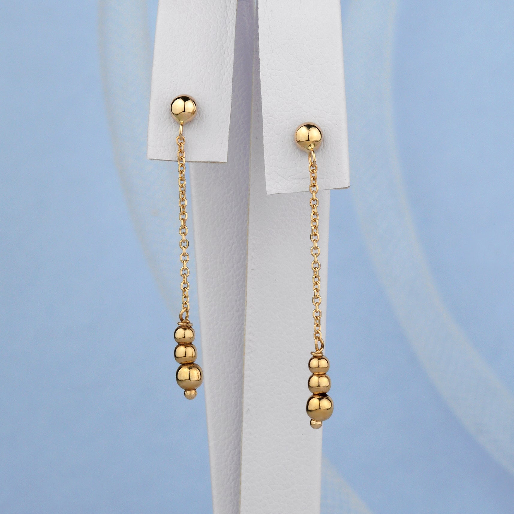 Złote wiszące kolczyki z kuleczkami 585