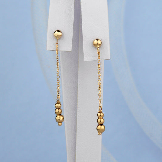 Złote wiszące kolczyki z kuleczkami 585