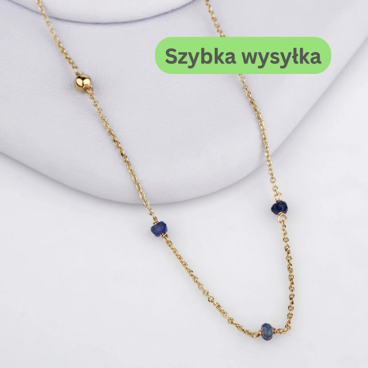 Naszyjnik z szafirami ze złota 585. Delikatny naszyjnik z szafirami. Złoty naszyjnik z naturalnymi szafirami. Elegancki naszyjnik z szafirami. Naszyjnik z niebieskimi szafirami ze złota 585. Minimalistyczny naszyjnik z szafirami. Subtelny naszyjnik z szafirami. Naszyjnik z naturalnymi szafirami ze złota 585. Złoty łańcuszek z szafirami. Delikatny złoty łańcuszek z szafirami. Naszyjnik z kuleczkami i szafirami. Złoty naszyjnik z niebieskimi kamieniami. Naszyjnik z szafirami i złotymi kuleczkami.