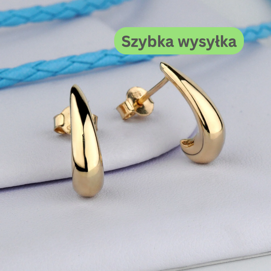 Złote kolczyki z 14-karatowego złota.
Eleganckie kolczyki wykonane z żółtego złota 585. Delikatne kolczyki ze złota na co dzień. Klasyczne złote kolczyki damskie z 14-karatowego złota. Minimalistyczne kolczyki ze szlachetnego złota 585. Złote kolczyki damskie. Stylowe kolczyki z litego złota próby 585. Subtelna biżuteria kolczyki ze złota. Eleganckie złote kolczyki idealne na prezent. Kolczyki ze złota próby 585.